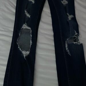 Distressed Dark Blue Jeans